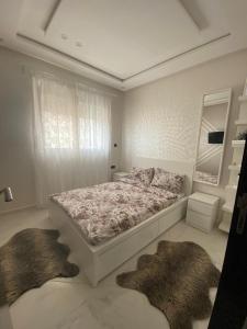 Ένα ή περισσότερα κρεβάτια σε δωμάτιο στο Cozyhome