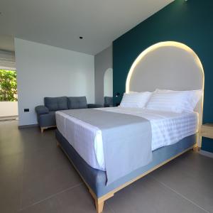 Voodi või voodid majutusasutuse Sunset Boulevard Hotel toas