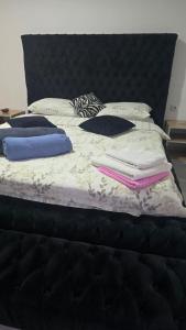 Postel nebo postele na pokoji v ubytování Exit apartmani