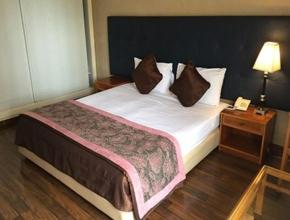 Voodi või voodid majutusasutuse Charles Hotel toas