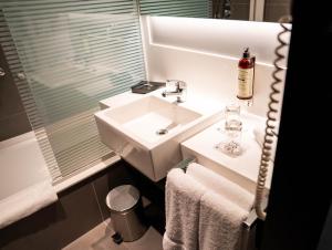 Um banheiro em Novotel Lima San Isidro