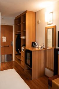 A cozinha ou cozinha compacta de Novotel Lima San Isidro