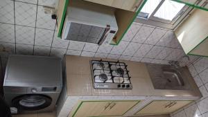 Kuchyň nebo kuchyňský kout v ubytování POUANGO Home
