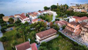 an aerial view of a small town by the water at Ever Green in Kavos