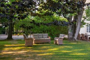 A garden outside Villa Giardino Lucca heated pool, 2 miles Lucca