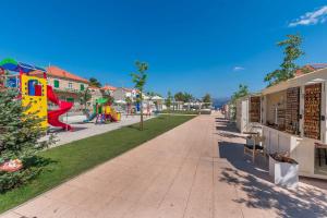 Ο χώρος παιχνιδιού για παιδιά στο Apartments Etica