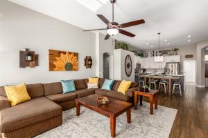 a living room with a couch and a table at Harrison Chandler in Chandler