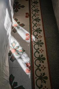 A bed or beds in a room at Villa Giardino Lucca heated pool, 2 miles Lucca
