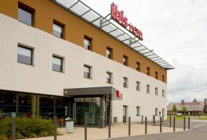 a rendering of the front of the hotel at ibis Montceau les Mines in Montceau-les-Mines