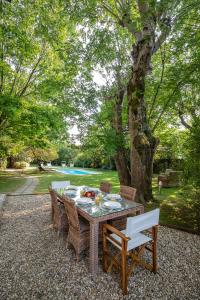 A garden outside Villa Giardino Lucca heated pool, 2 miles Lucca