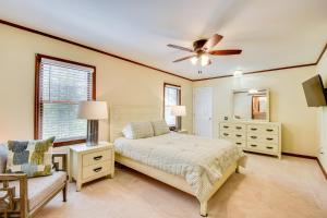 a bedroom with a bed and a ceiling fan at Deck and Game Room Mountaintop Hideaway in Tiger! in Tiger