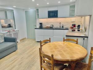 Kuchyň nebo kuchyňský kout v ubytování Duplex 57m2 tout équipé pour long séjour proche Paris et Versailles + 11 fotografií