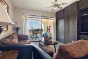a living room with a couch and a table at Princesa De Penasco in Punta Penasco New
