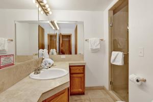 a bathroom with a sink and a mirror at Knickerbocker retreat #2321 in Big Bear Lake +21 photos