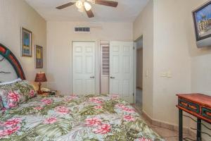 a bedroom with a bed and a ceiling fan at Princesa De Penasco in Punta Penasco New +18 photos