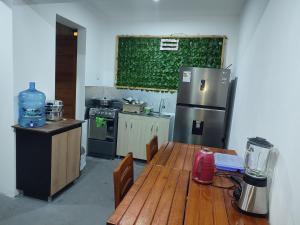 Η κουζίνα ή μικρή κουζίνα στο Hospedaje velilu +18 φωτογραφίες