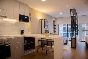 Η κουζίνα ή μικρή κουζίνα στο Majestic 1BR with Balcony in Miraflores