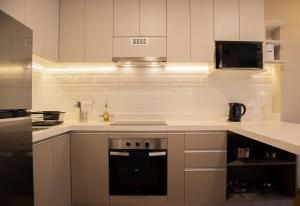 Η κουζίνα ή μικρή κουζίνα στο Majestic 1BR with Balcony in Miraflores