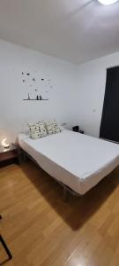 Postel nebo postele na pokoji v ubytování Vacaciones paraíso