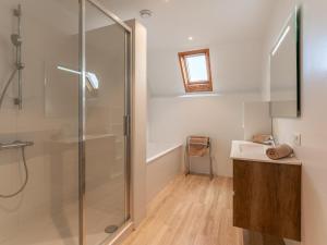 a bathroom with a shower and a sink at La Ciotat in Sint-Idesbald +24 photos