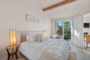 Ένα ή περισσότερα κρεβάτια σε δωμάτιο στο Carlsbad Retreat by the Sea