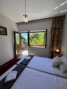 Postel nebo postele na pokoji v ubytování Apartments by the sea Orebic, Peljesac - 4496