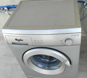 a washing machine with its door open with a washer at Safay Al Hoceima nr 5 in Al Hoceïma