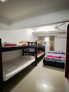 Ένα ή περισσότερα κρεβάτια σε δωμάτιο στο Apartamento Villa Saika