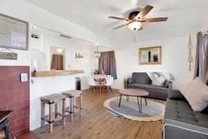 a living room with a couch and a table at The cottage #2504 in Sugarloaf