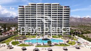 an image of a large building with a swimming pool at Playa Blanca Premier Unit 1410 in San Carlos