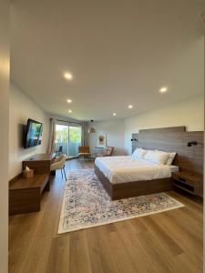 Ένα ή περισσότερα κρεβάτια σε δωμάτιο στο Hotel 19