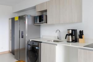 Kuchyň nebo kuchyňský kout v ubytování Viva Jaco + 30 fotografií