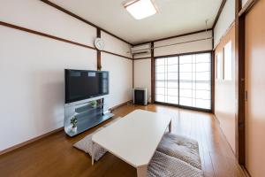 TV a/nebo společenská místnost v ubytování SHINODA BASE 1 minute walk from Aomori Station篠田ベース