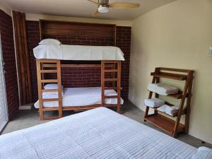 Ένα ή περισσότερα κρεβάτια σε δωμάτιο στο Bamboo C House +3 φωτογραφίες