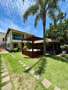 Κήπος έξω από το Casa de Praia Bicanga com SPA +8 φωτογραφίες