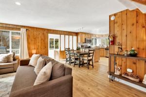 a living room with a couch and a table at Conklin paradise #1993 in Big Bear Lake