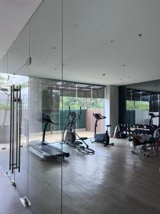 a gym with several exercise bikes in a room at 1Bedroom Unit at the Center of Cebu City, Cebu in Cebu City