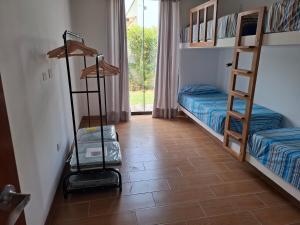 Postel nebo postele na pokoji v ubytování Condominio ecológico las gardenias de Asia + 24 fotografií