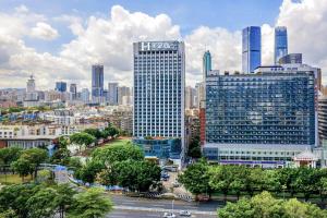 a view of a city with tall buildings at Starlit sky Hotel - Shenzhen Luohu Baoneng Center Branch in Shenzhen