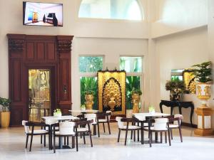 TV a/nebo společenská místnost v ubytování Lbn Asian Hotel