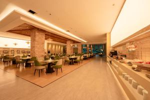Restaurace v ubytování Zhangjiajie Chensheng International Hotel