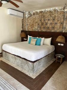 Cama o camas de una habitación en Mia Tulum Beachfront Resort - Ocean View Suites and Beach Club