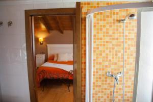 Postel nebo postele na pokoji v ubytování Hostal El Recanto