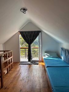 Postel nebo postele na pokoji v ubytování Sagada Tiny House with a view