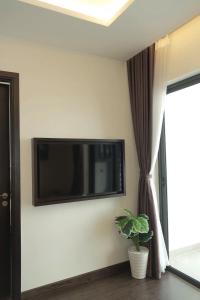 TV a/nebo společenská místnost v ubytování Bay View Homestay