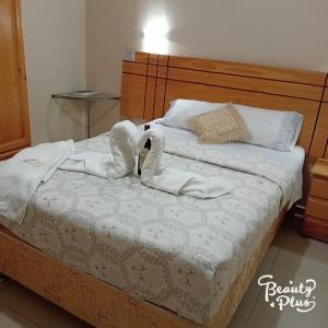 Postel nebo postele na pokoji v ubytování Hotel Sol de Grau