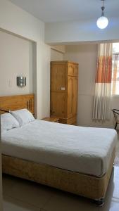 Postel nebo postele na pokoji v ubytování Hotel Sol de Grau