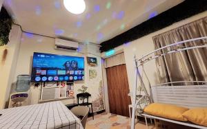 富貴民宿Full Great B&B包棟名宿客房内的一张或多张床位