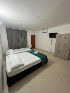 Ένα ή περισσότερα κρεβάτια σε δωμάτιο στο Stay Mar y Playa House +5 φωτογραφίες