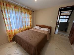 Ένα ή περισσότερα κρεβάτια σε δωμάτιο στο Cabaña Las Retamas +13 φωτογραφίες